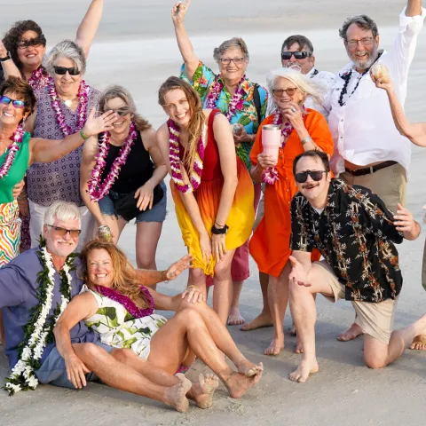 a group of people posing for the camera