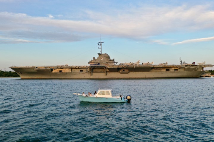 a small boat in a large body of water